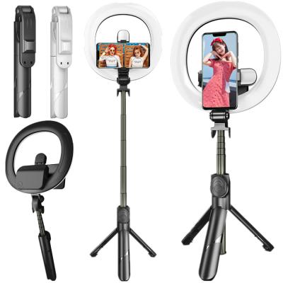 China 2021 Hot Sales Portable Flexible Ready To Board Portable Tripod With Wireless Selfie Holder Selfie Stick Tripod for sale