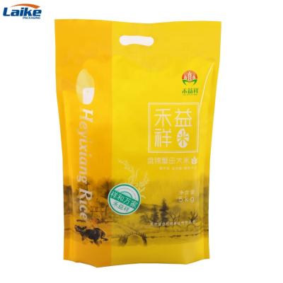 China Custom Waterproof Moisture Proof Rice Bag Three 5kg Vacuum Laminated Printing Plastic Side Sealed Rice Bag With Handle for sale