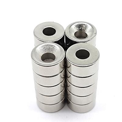 China Wind Generators N52 Disc Hole Neodymium Iron Boron Magnet with Powerful Magnetization for sale