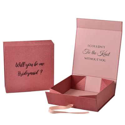 China Recyclable Collapsible Glitter Box Wig Packaging Boxes Custom Design Hair Extension Packaging Box With Ribbon for sale