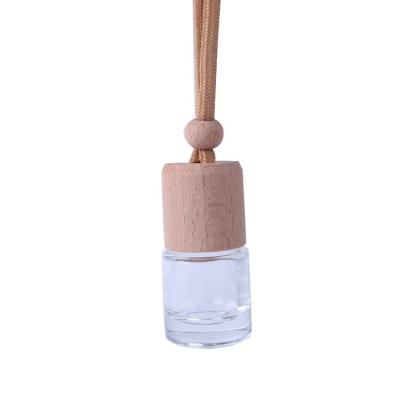 China Glass Diffuse Material Shape Daily Empty Refill Cylinder Necessities 8ml Fragrance Pendant Perfume Bottle And Personal Care Use Industrial Car for sale