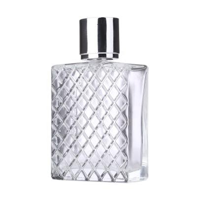 China Daily Necessities 00ML Lattice Body Shaped Transparent Glass Cosmetic Perfume Bottle Empty Aluminum Sprayer Bottle for sale