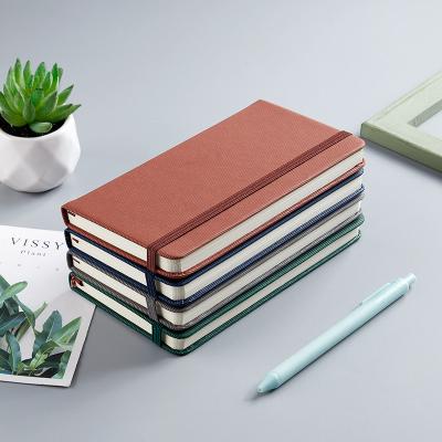 China Pocket 80gsm PU Notebooks A6 Notebooks Business Cream Elastic Band Portable Paper Books Printed Custom Notebook for sale