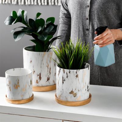 China Elegant Marble Design Matt White Glazed Ceramic Flower Pot With Bases Flower Pots Bamboo Planters Garden for sale