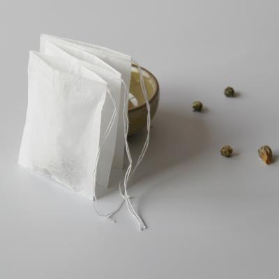 China Disposable Filter Paper Natural Tea Infuser Bags Drawstring Tea Bags for sale