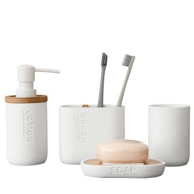 China Sustainable Wholesale Ceramic Toiletries Sanitary Ware Set 4 Pieces Bathroom Set for sale