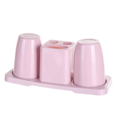 China Viable Modern Multi Colors Four-piece Bathroom Accessories Set Plastic Toothbrush Holder Holder For Bathroom Home Hotel for sale