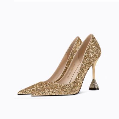 China 2022 fall glitter gold high heels breathable faux stones pointed toe heels wedding shoes for bride women stilettos for sale