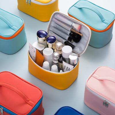 China Durable Professional Portable Leather Cosmetic Makeup Storage Zipper Travel Designer Storage Box PU Cosmetic Square Bag for sale