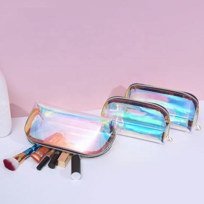 China 2021 New TPU Durable Cosmetic Colorful Laser Water Proof High Capacity Portable Custom Makeup Toiletry Bag for sale