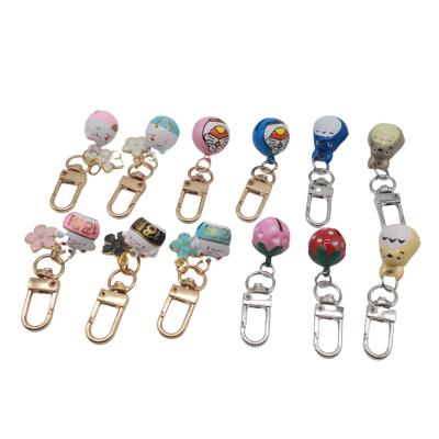 China Metal Cartoon Design Metal Key Chain Colorful Creative Gift Clothing Car Bag Bell Key Chain Accessories Copper Key Pendant for sale