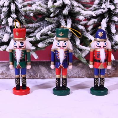 China Wooden Decoration 2022 New 13cm Kanggang Christmas Soldier Pendant For Kids Nutcracker Christmas Cartoon Nutcracker Set 3 Pieces for sale