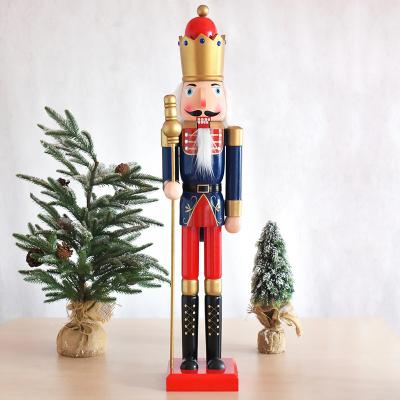 China Kanggang Stain Soldier 90cm Wooden European Style Painted Giant Nutcracker Shopping Mall Showroom Store Decoration for sale