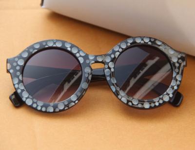 China Fashion Sunglasses New Products Round Shaped Sun Glass Women Custom Sunglasses for sale