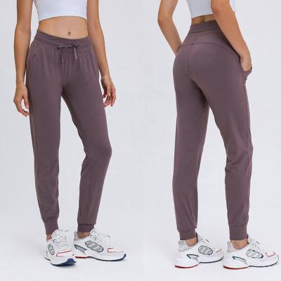 China Quick Dry Running Fitness Track Pants Workout High Waisted Breathable Yoga Sweatpants With Pockets Drawstring Women Jogger Pants for sale