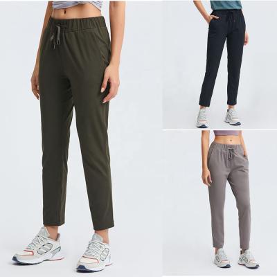 China Wholesale Breathable Workout Clothes Casual Yoga Pants Drawstring Elastic Waist Sports Jogger Pants With Pockets Sport Tracksuit For Women for sale