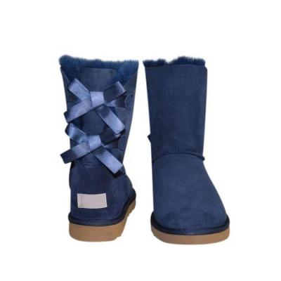 China Anti-odor Girls Winter Shoes Warm Outdoor Shoes Fur 2 Bows Boots for sale