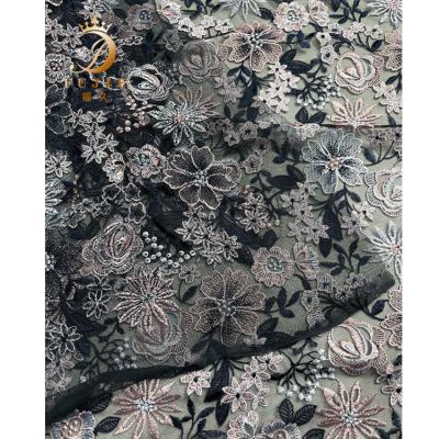 China Fujiu Jacquard Textiles Embroidery Fabric Organic Tulle Fabric for sale