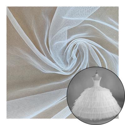 China Hot Sale Luxury Beaded Bridal Silk Tulle Shrink-resistant Embroidery Lace Up Nylon Fabric For Wedding Dresses for sale