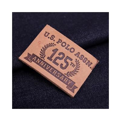 China Washable custom made personalized leather label genuine jeans logo leather patch for garment for sale