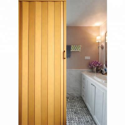 China PVC Waterproof Teak Accordion Wood Folding Door With Soft Hinge for sale