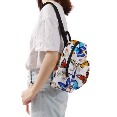 China Top Selling Stylish Vivid Printing Butterfly Waterproof Mini Backpack Polyester School Backpack Bags Women Gift for sale