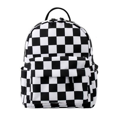 China New small white schoolbag pattern printing waterproof sale black and white plaid backpack for sale