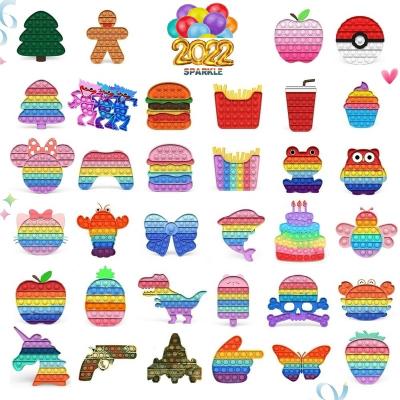 China The fidgety person push jumped stock GETPOP toys mixed! Christmas New Year Gift Bag Snap Button Playtime Set Silicone Pushing Noises Bubbling Person Stirring Toy Ranibow Stress Relief Toys Sensory for sale