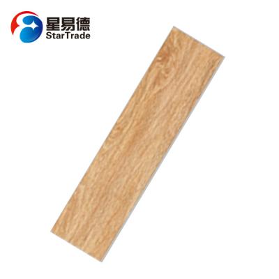 中国 Foshan home decor rustic non slip floor tile waterproof wood ceramic tile 販売のため