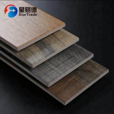 China Foshan ceramic wood pattern interior wall waterproof wood look ceramic floor tile for sale