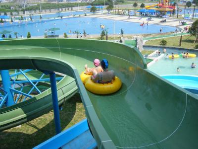 China Water Park Family Raft Slide Fiber Glass Outdoor Water Slides For Adults for sale