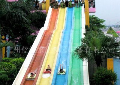 China Toboganes acuáticos al aire libre del niño del arco iris 4 líneas, diversión del agua del día de fiesta en venta