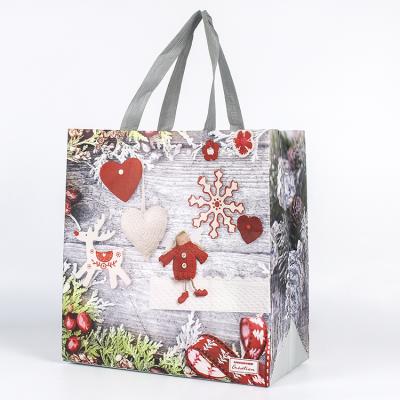 China Ultrasonic Non Woven Fabric Carry Christmas Gifts Packaging Bag For Shopping for sale