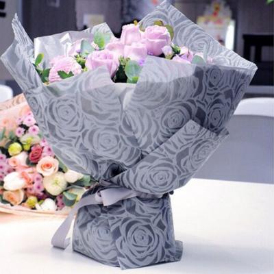 China Anti-bacteria Printed And Embossed Polypropylene PP Spunbond Nonwoven Fabric Paper Flower Eco-friendly Nonwoven Embossed Wrapping for sale