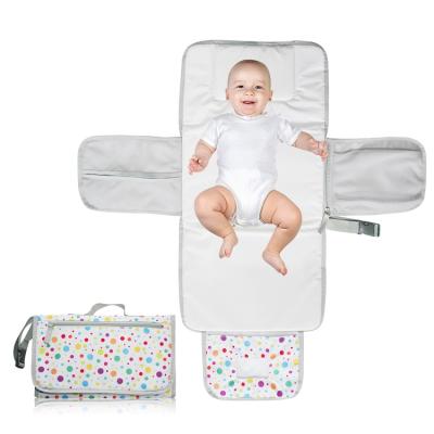 China Baby Travel Portable Diaper Station Protector Changing Changing Clutch Diaper Pad Clutch Bag for sale