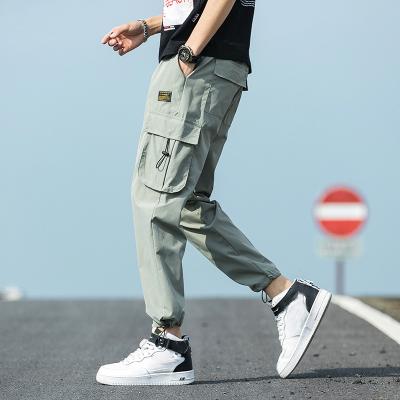 China New Anti-wrinkle summer sports pants men's pants slim up casual Korean version men's hanging pants for sale