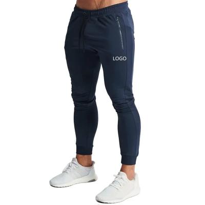 China OEM Breathable Custom Workout Gymwear Men Mask Track Pants Slim Fit Zipper Jogger Pants Sweatpants Joggers for sale