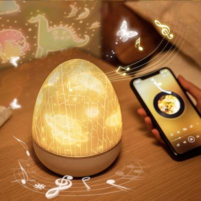 China Modern Bedroom Night Light Warm Led Egg Projection Lamp Shining Cracked Cracked Light Sleep Night Light for sale