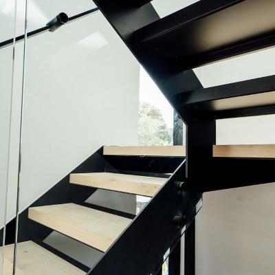 China Modern Black Powder Coated Carbon Steel Double Side Stringer Wooden Step Staircase for sale