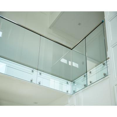 China Modern frameless glass balustrade with standoff polish stainless steel glass balcony railing for sale