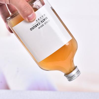 China 100ml200ml250ml350ml500ml Clear Glass Beer Liquor Bottle Eco-friendly Intense Flat Cold Juice Bottle Glass Bottle With Aluminum Cap for sale