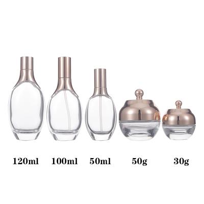 China Clear Cosmetics Bottle 30ml 50ml 100ml Custom Cosmetic Luxury Liquid Base Glass Bottles Glass Cosmetics Costomizable for sale