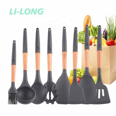 China New 9 Pieces Disposable Silicone Kitchenware Handle Wooden Beech Set Pot Shovel Hedge Spoon Nonstick Kitchen Cooking Combination Tool for sale