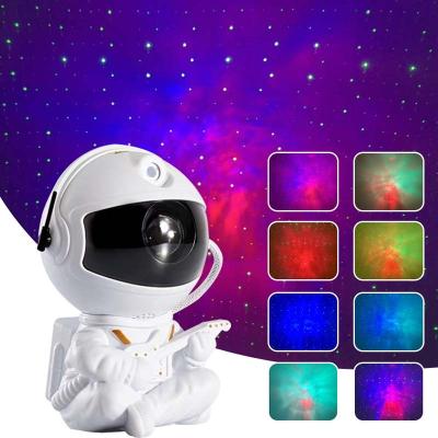 China New-designed Cute Astronaut Sitting Lamp Star Table Lamp Sky Star Galaxy Projector Decorative Astronaut for sale