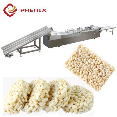 China cereal bar chocolate candy peanut candy making machine/peanut cereal brittle molding machine from Phnenix Machinery for sale