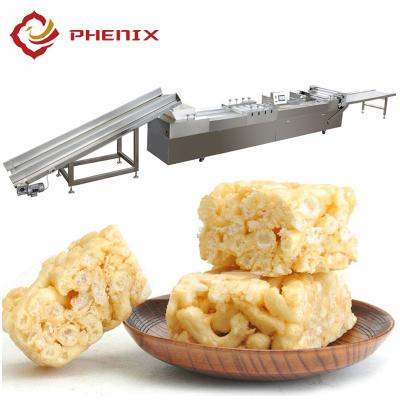 China Cereal Bar Cereal Candy Forming Crispy Rice Balls Making Machine Rice Ball Maker From Phoenix Machinery for sale