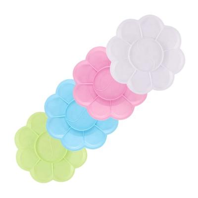 China Mordern small simple wholesale diameter 13.5cm 10 grids round plum blossom color simple design plastic painting palette for sale