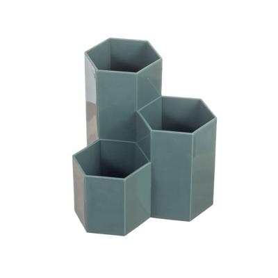 China Creative Simple Hexagonal PP Dormitory Desktop DIY Plastic Pencil Pen Desk Hexagonal Cute Holder for sale