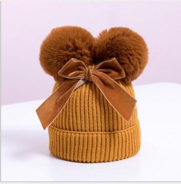 China Lovely COMMON double bowknot children knitted hat autumn winter new add cotton baby hat winter warm hats for sale