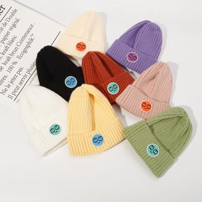 China New 2021 COMMON Autumn And Winter Color Knitted Warmth Beanie Knitted Hat Winter Hat For Kids for sale